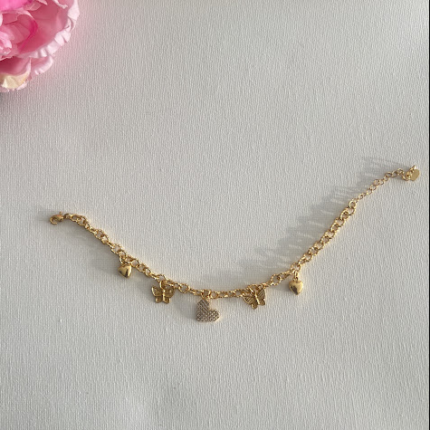 Gold plated bracelet with charms