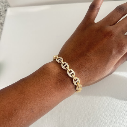 Gold chain link bracelet with zircon stones