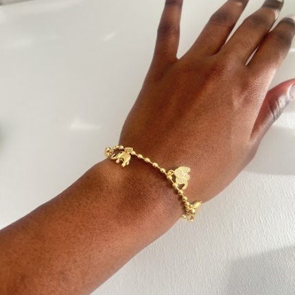 Gold plated balls bracelet with elephant charms